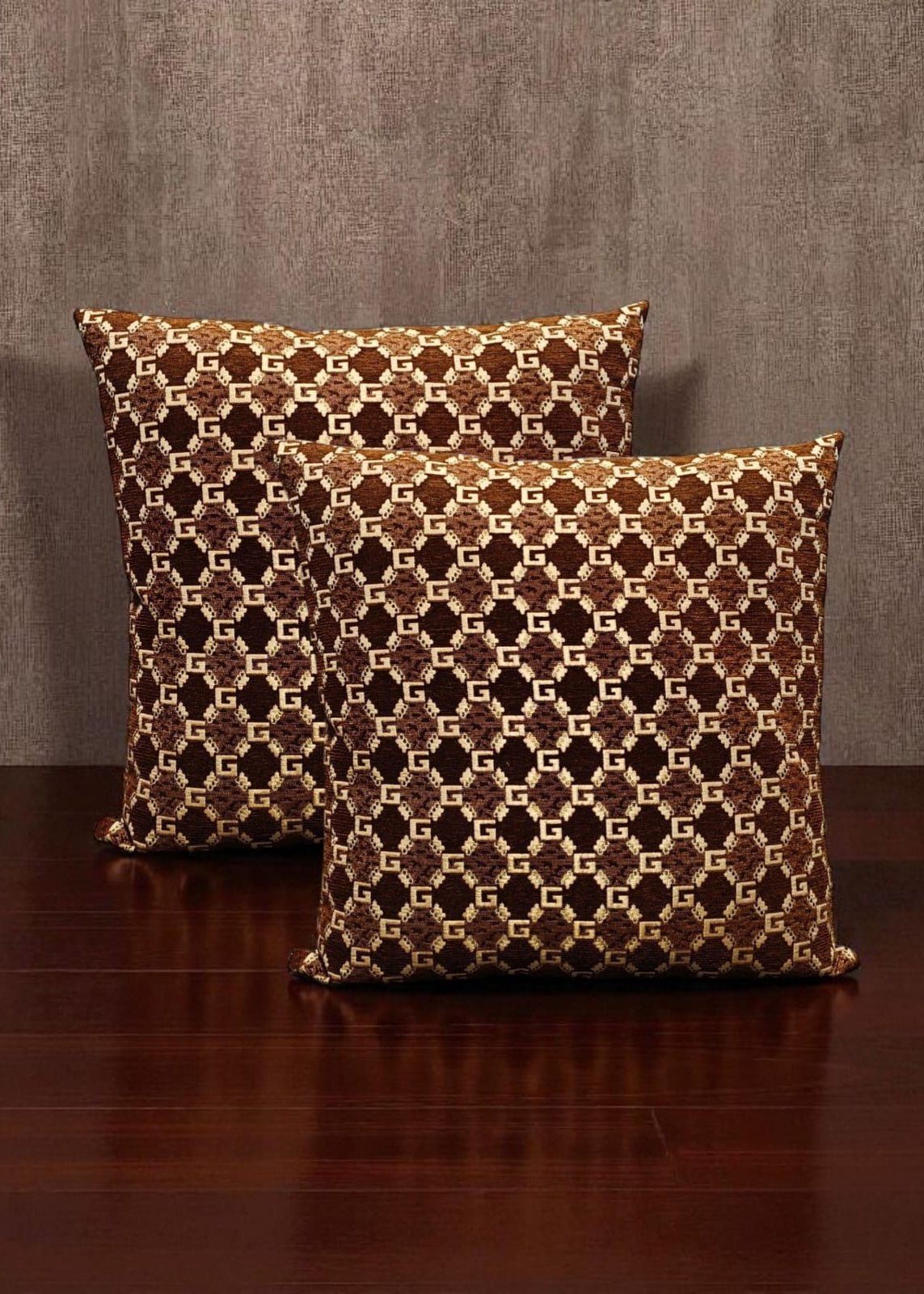Two patterned pillows on a wooden surface with a brown background